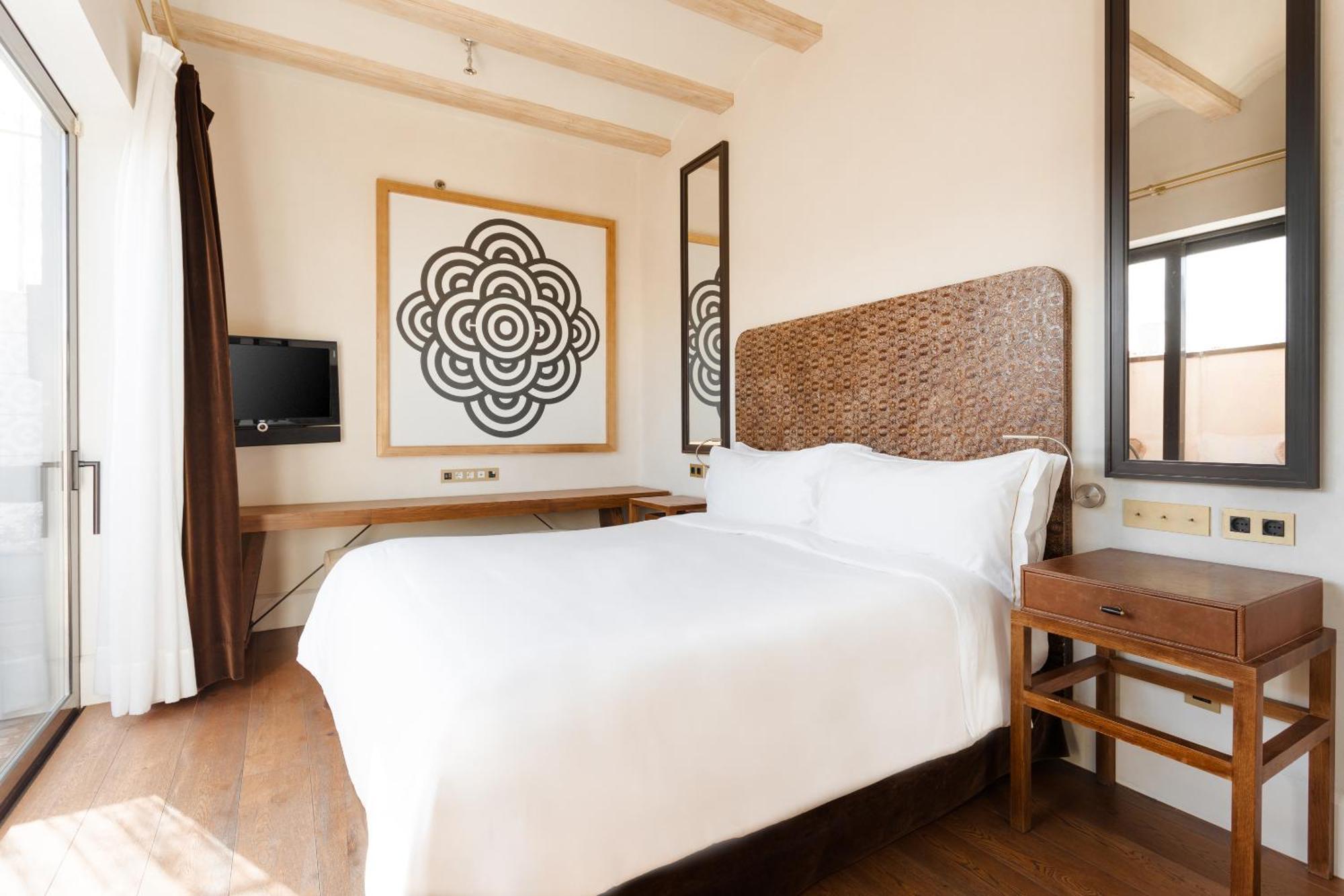 Do Placa Reial Powered By Sonder Barcelona Phòng bức ảnh A bedroom at the hotel