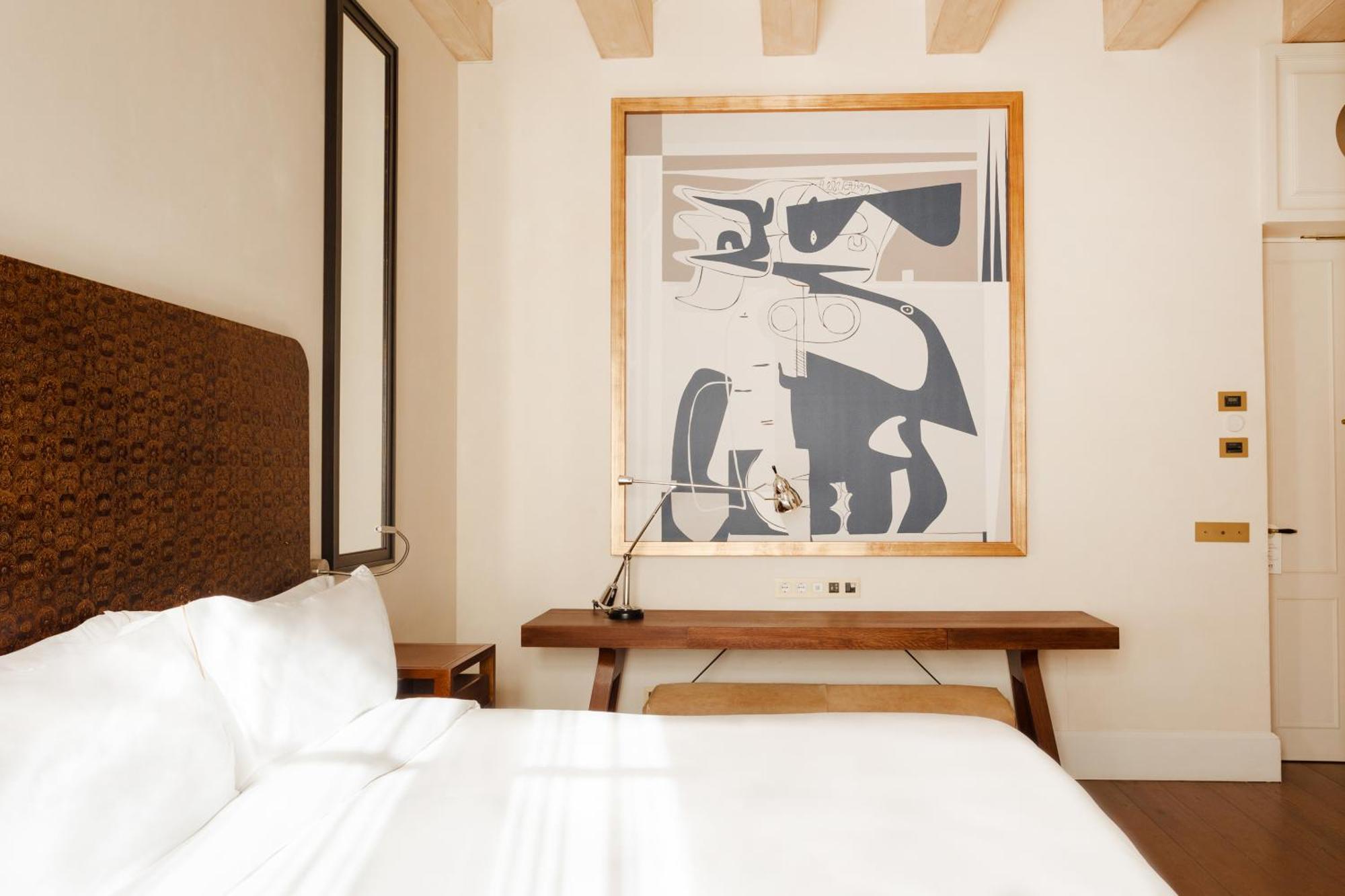Do Placa Reial Powered By Sonder Barcelona Phòng bức ảnh A bedroom at the Hotel Chaco